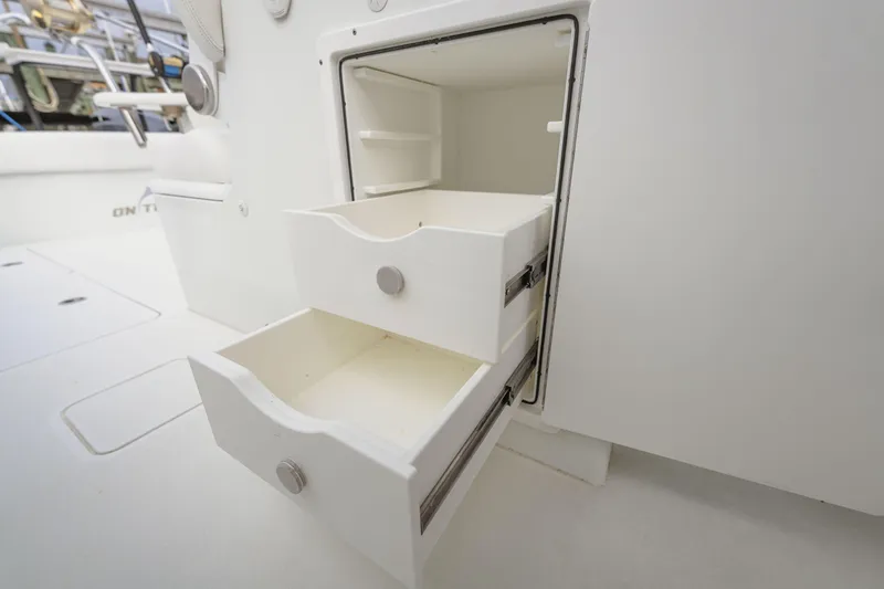 Slide: The Image of Open storage drawers on a 2018 Freeman 37 VH boat interior. - 25