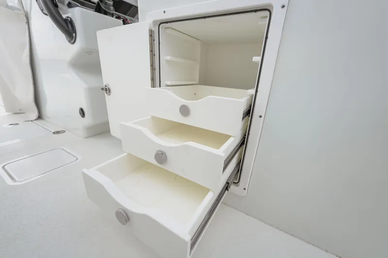 Slide: The Image of Open storage drawers on a 2018 Freeman 37 VH boat interior. - 27