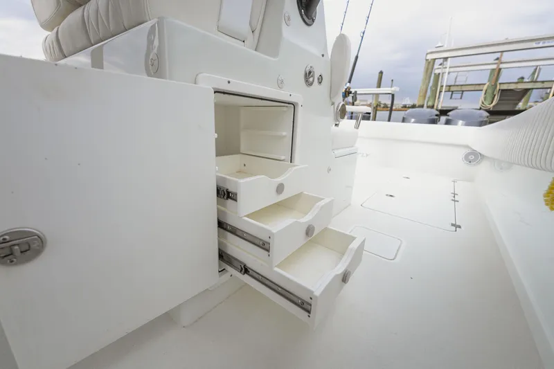 Slide: The Image of Freeman 37 VH 2018 boat interior with open storage drawers and seating. - 28