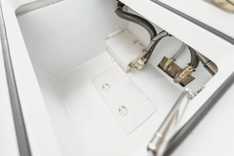 Slide: The Image of 2018 Freeman 37 VH boat compartment with hoses and fittings. - 31