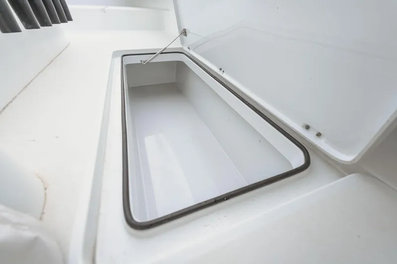 Slide: The Image of Open storage compartment on a 2018 Freeman 37 VH boat, showcasing interior space. - 32