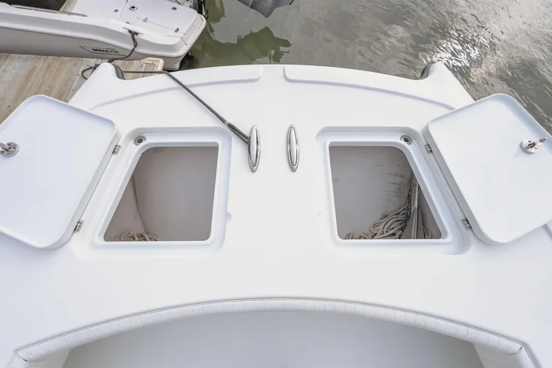 Slide: The Image of Open storage compartments on a 2018 Freeman 37 VH boat deck. - 35