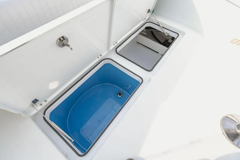 Slide: The Image of Open storage compartments on a 2018 Freeman 37 VH boat deck. - 39