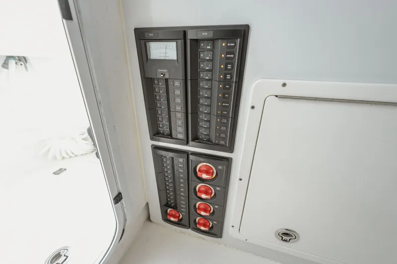 Slide: The Image of Electrical control panel on a 2018 Freeman 37 VH boat interior. - 42