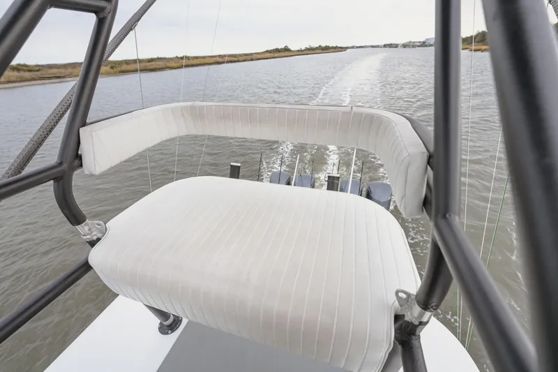 Slide: The Image of 2018 Freeman 37 VH boat seat overlooking waterway, showcasing sleek design and comfort. - 7
