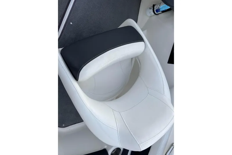 Slide: The Image of White and black seat of 2013 Larson LX 205S IO boat. - 17