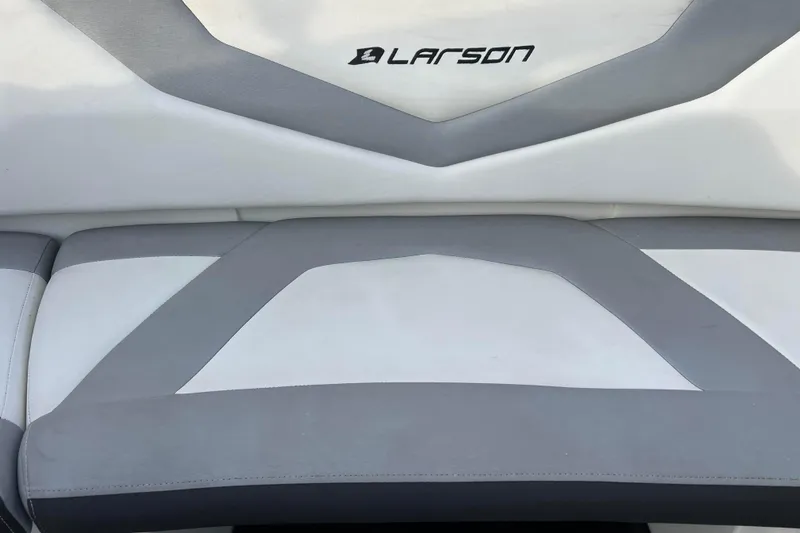 Slide: The Image of 2013 Larson LX 205S IO boat seat with gray and white upholstery. - 6