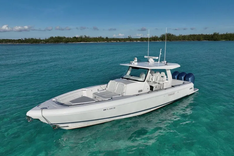 The Image of 2023 Intrepid 427 Nomad SE cruising on ocean near city skyline. - 0