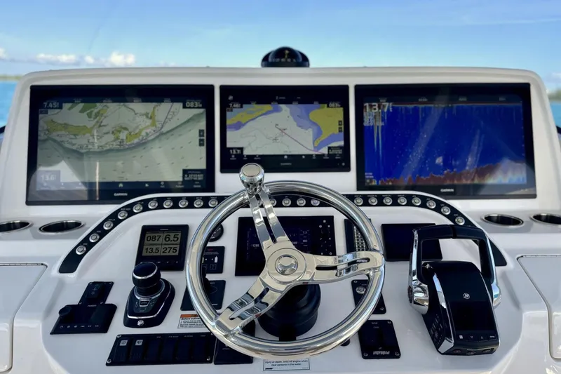 Slide: The Image of 2023 Intrepid 427 Nomad SE boat storage compartments and equipment details. - 28