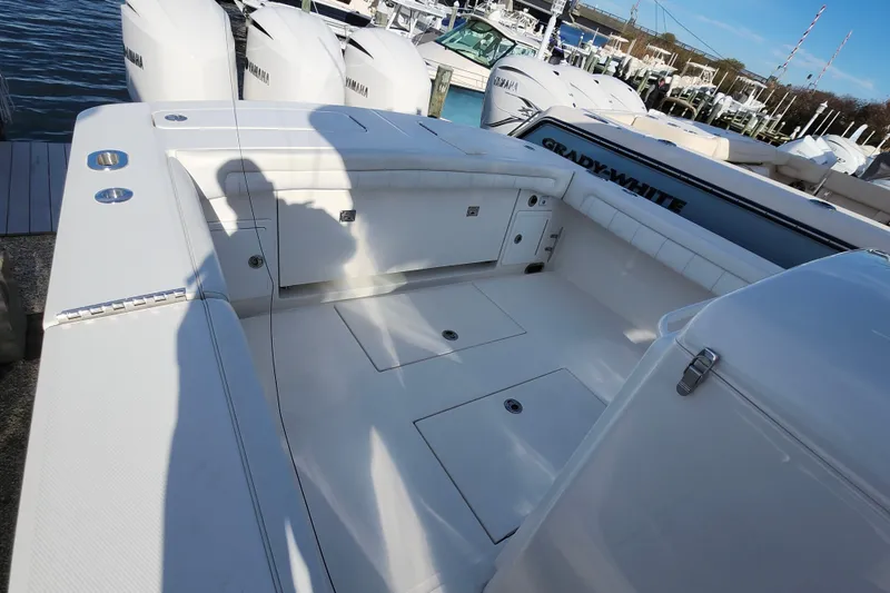 Slide: The Image of 2019 Regulator 34SS boat deck with Yamaha engines at marina. - 21