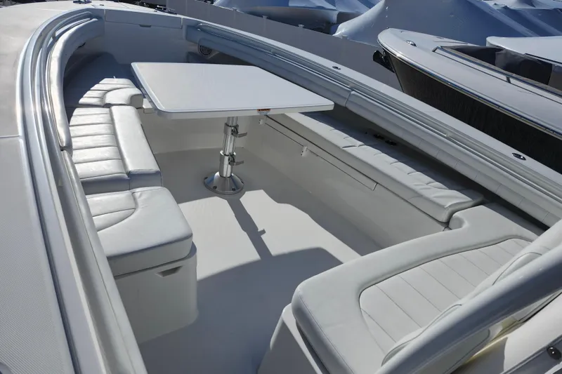 Slide: The Image of 2019 Regulator 34SS boat interior with white seating and table. - 25