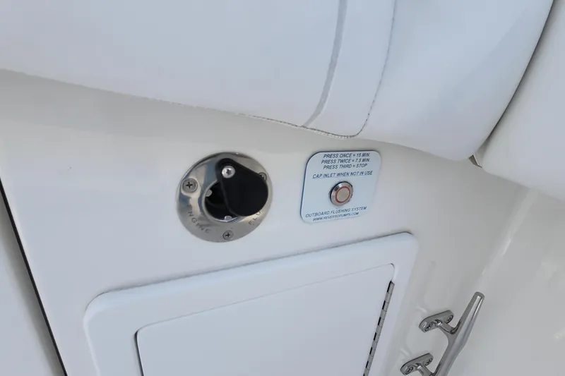 Slide: The Image of 2019 Regulator 34SS boat engine flush system with control panel and instructions. - 36