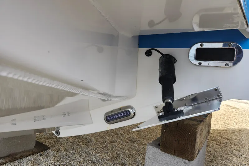 Slide: The Image of 2019 Regulator 34SS boat stern with trim tab and underwater light. - 41