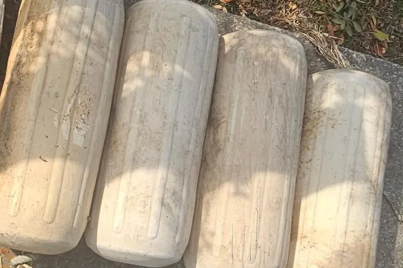 Slide: The Image of Manuals and CD for 2018 Sportsman Heritage 251 Center Console boat on a textured surface. - 10