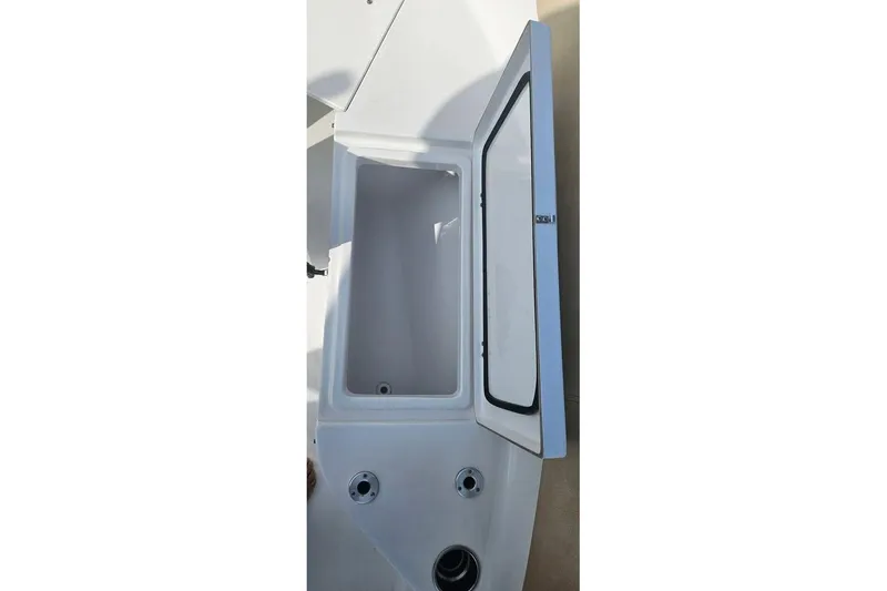 Slide: The Image of Dashboard of a 2018 Sportsman Heritage 251 Center Console with Simrad displays. - 12