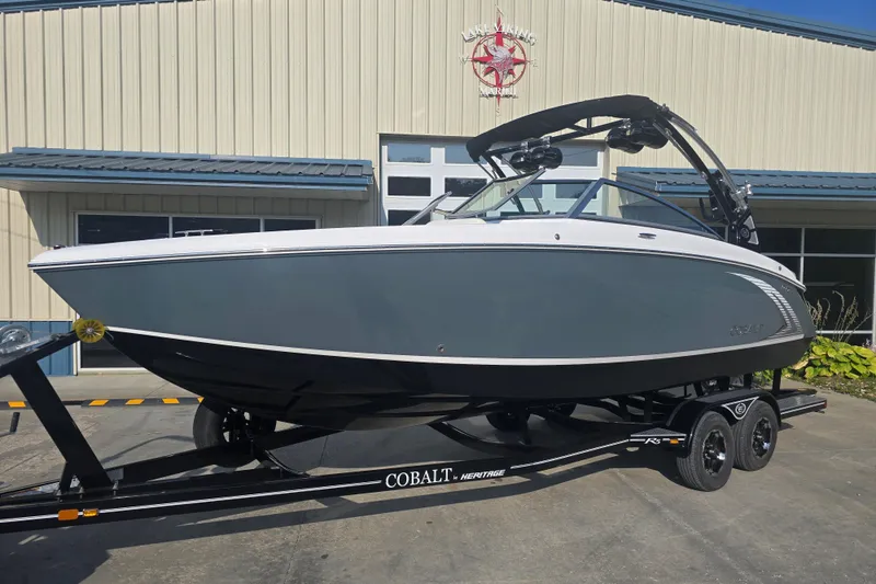 Slide: The Image of 2019 Cobalt R5 Surf boat on trailer outside a marine facility. - 15