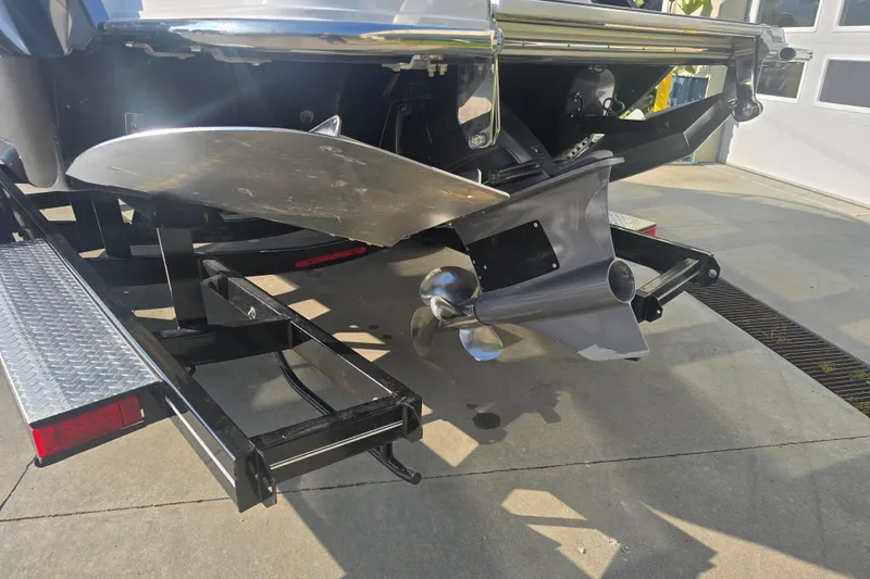Slide: The Image of 2019 Cobalt R5 Surf boat propeller and trailer detail in sunlight. - 18