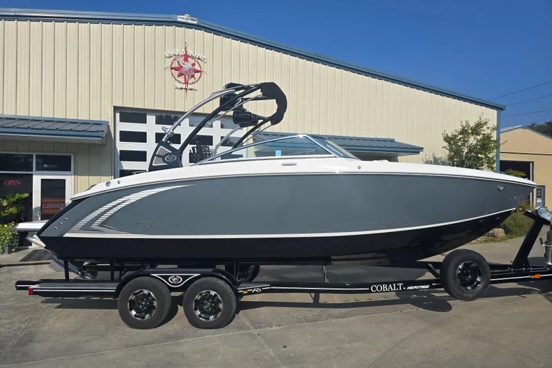 Slide: The Image of 2019 Cobalt R5 Surf boat on trailer outside a dealership. - 21