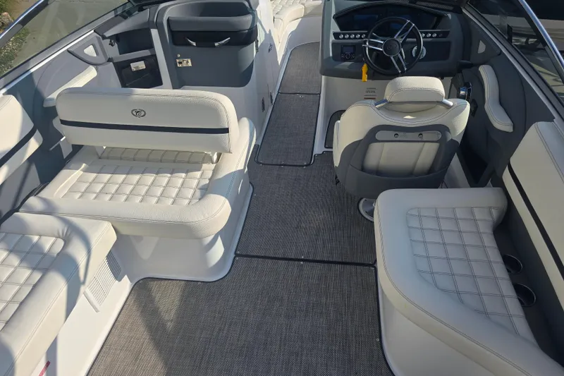 Slide: The Image of 2019 Cobalt R5 Surf boat interior with luxurious seating and modern dashboard. - 23