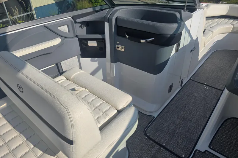 Slide: The Image of 2019 Cobalt R5 Surf boat interior with luxurious seating and modern design. - 24