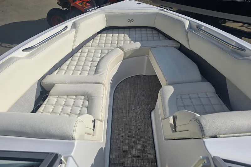 Slide: The Image of 2019 Cobalt R5 Surf boat interior with white cushioned seating. - 33