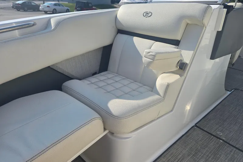 Slide: The Image of Luxurious seating in 2019 Cobalt R5 Surf boat, featuring elegant white upholstery. - 34