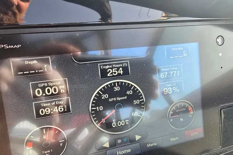 Slide: The Image of Dashboard of a 2019 Cobalt R5 Surf boat showing engine hours and water temperature. - 41