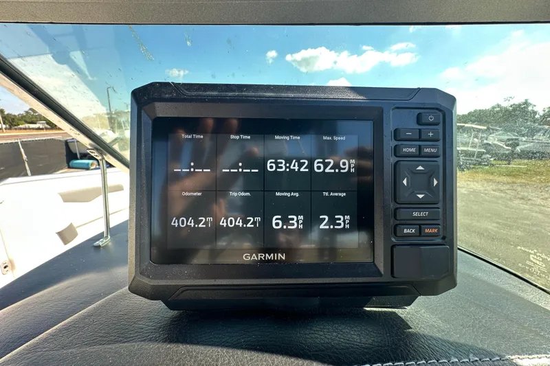 Slide: The Image of Garmin GPS display on 2015 Chaparral 246 boat showing speed and odometer readings. - 15
