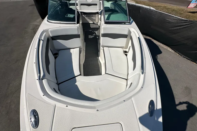 Slide: The Image of 2015 Chaparral 246 boat with spacious seating and open deck design. - 63