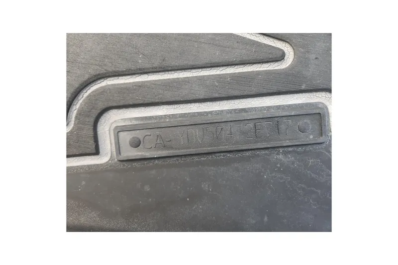 Slide: The Image of Close-up of 2017 Sea-Doo GTI SE 130 hull identification number. - 14