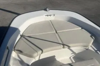 Slide: The Image of 2023 Boston Whaler 170 Montauk boat interior with cushioned seating. - 9