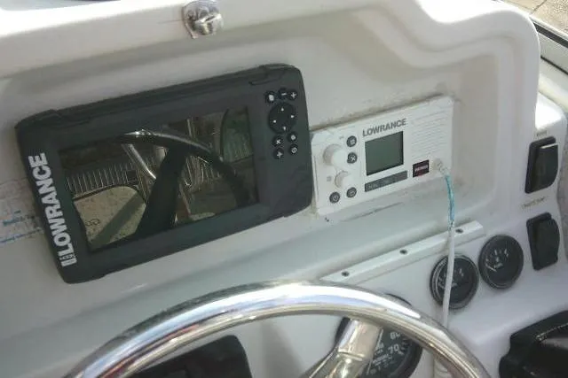 Slide: The Image of Console of 2003 Glacier Bay 2240 Dual Console with Lowrance electronics. - 46