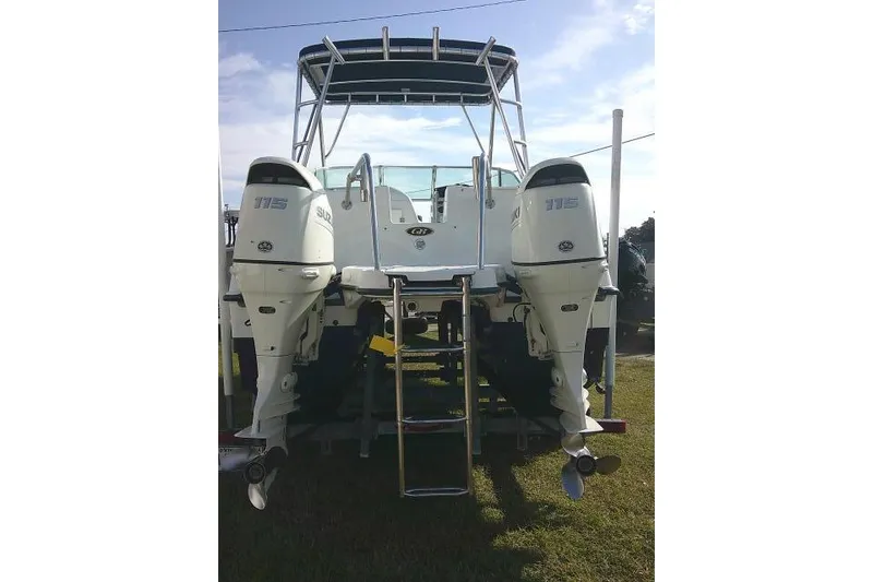 Slide: The Image of 2003 Glacier Bay 2240 Dual Console boat with twin 115 horsepower engines. - 9