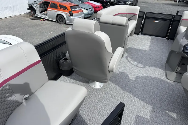 Slide: The Image of 2024 Qwest 8518 RLS boat interior with gray seating and modern design. - 4