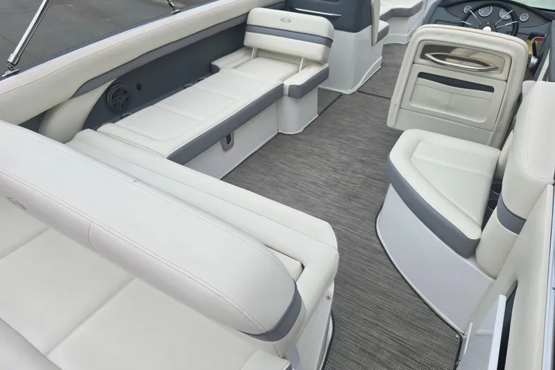Slide: The Image of Interior of a 2016 Marker One ML4 boat with white and gray seating. - 24