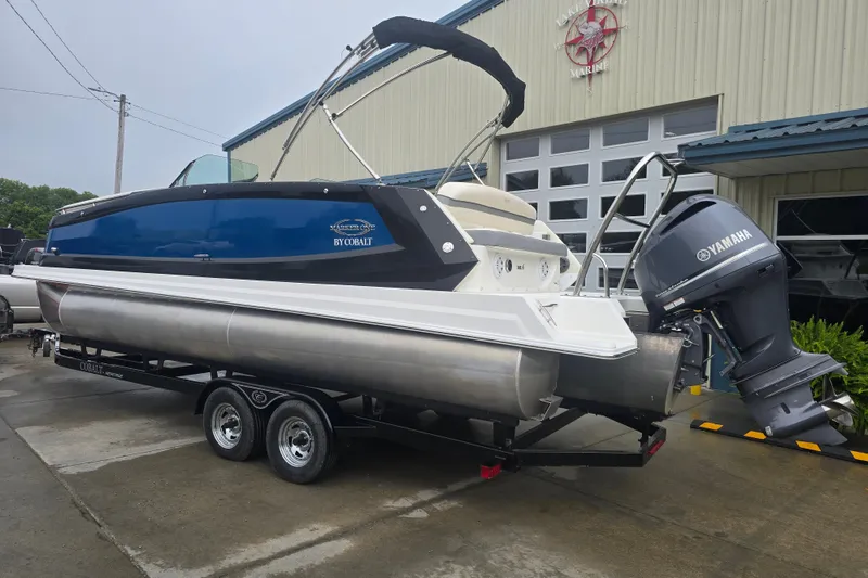 Slide: The Image of 2016 Marker One ML4 pontoon boat with Yamaha outboard motor on trailer. - 3