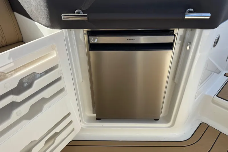 Slide: The Image of Stainless steel refrigerator on 2026 Sea Ray SLX 310 boat interior. - 12