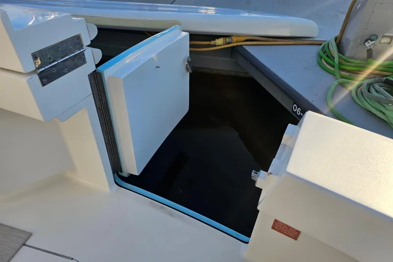 Slide: The Image of Open hatch on 2013 Viking 42 Convertible boat, dockside view. - 19