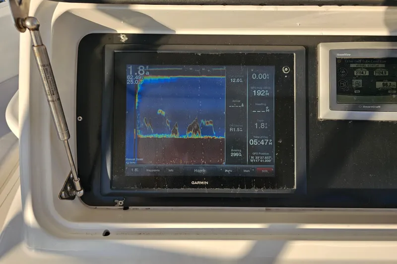 Slide: The Image of Garmin marine display on 2013 Viking 42 Convertible boat dashboard. - 28