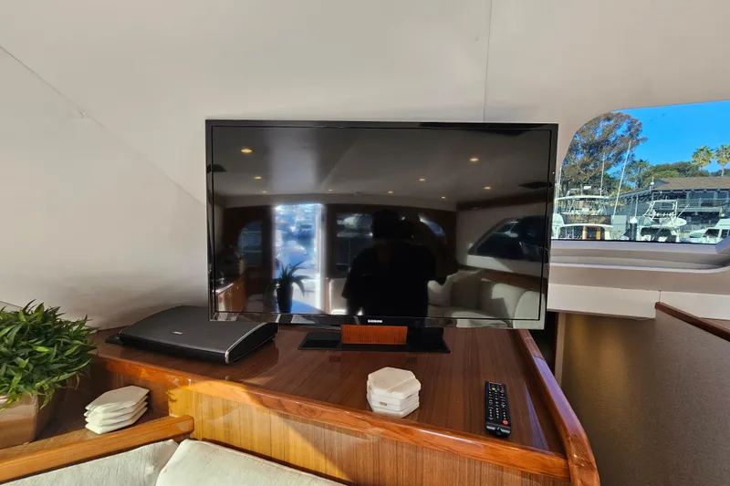 Slide: The Image of Interior of 2013 Viking 42 Convertible yacht with TV and decor. - 37