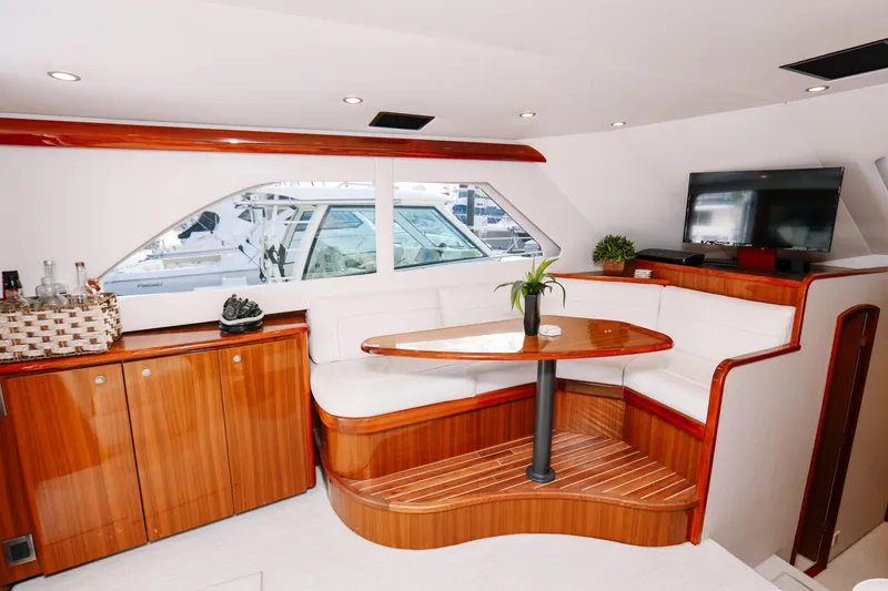 Slide: The Image of Luxurious interior of 2013 Viking 42 Convertible yacht with elegant seating and modern amenities. - 6