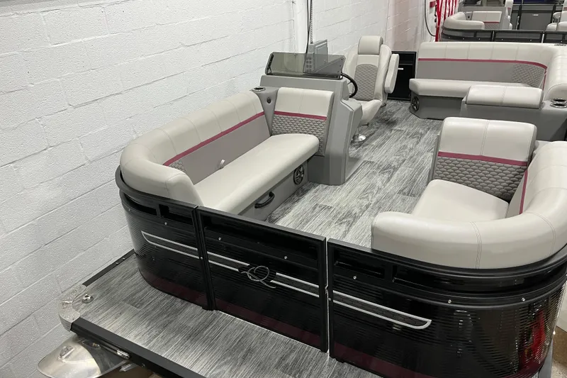 The Image of 2024 Qwest 8520 Lanai pontoon boat interior with modern seating and sleek design. - 1