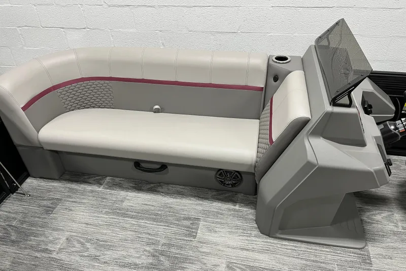 Slide: The Image of 2024 Qwest 8520 Lanai (XG02) boat interior with modern seating and console design. - 4