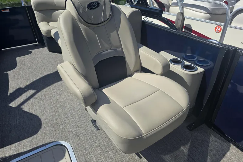 Slide: The Image of Luxurious seating on 2020 Barletta C24QC pontoon boat with cup holders. - 14