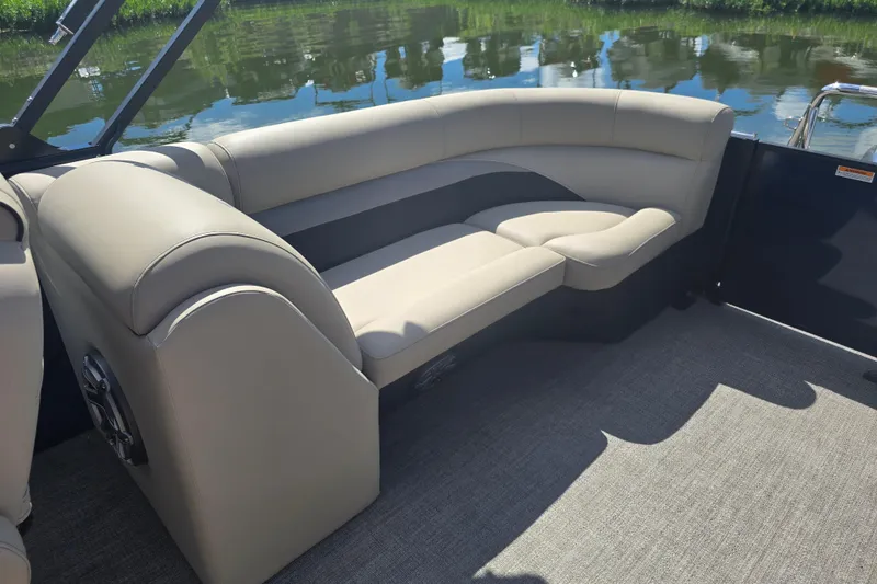 Slide: The Image of 2020 Barletta C24QC boat interior with beige seating and water view. - 20