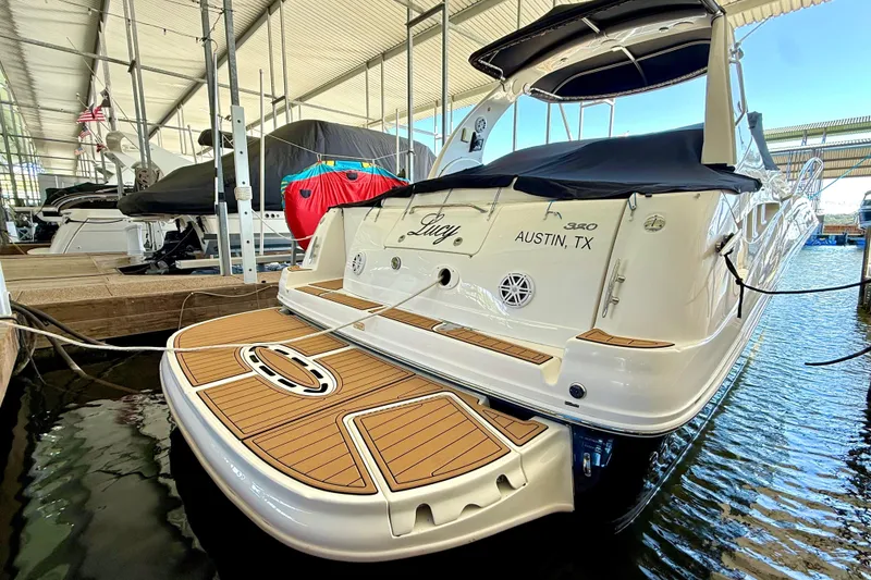 Slide: The Image of 2006 Sea Ray 320 Sundancer docked in Austin, TX marina. - 11