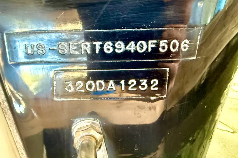 Slide: The Image of Hull identification number on 2006 Sea Ray 320 Sundancer boat. - 15