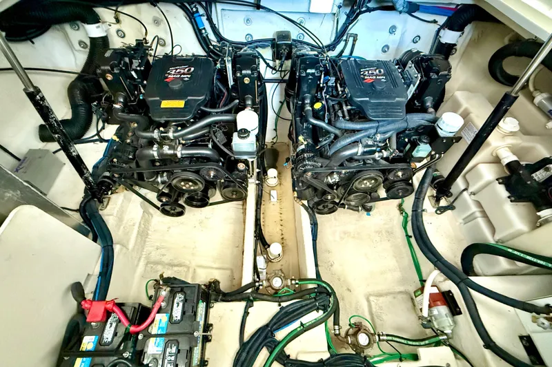 Slide: The Image of Engine compartment of 2006 Sea Ray 320 Sundancer with twin 350 MAG MPI engines. - 25