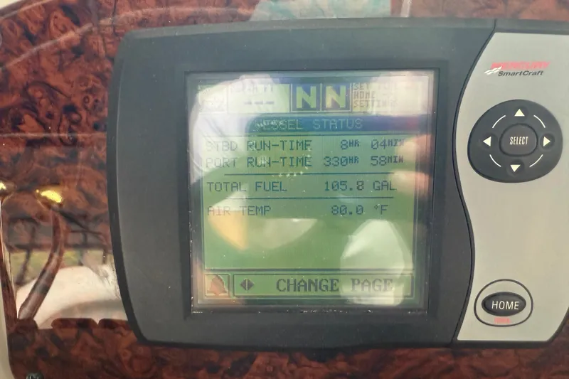 Slide: The Image of Display screen on 2006 Sea Ray 320 Sundancer showing engine and fuel data. - 33