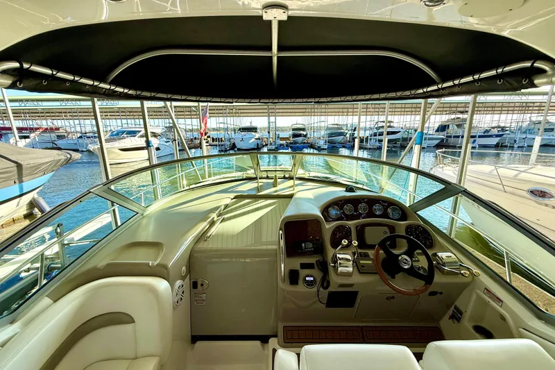 Slide: The Image of Interior view of 2006 Sea Ray 320 Sundancer yacht at marina. - 46